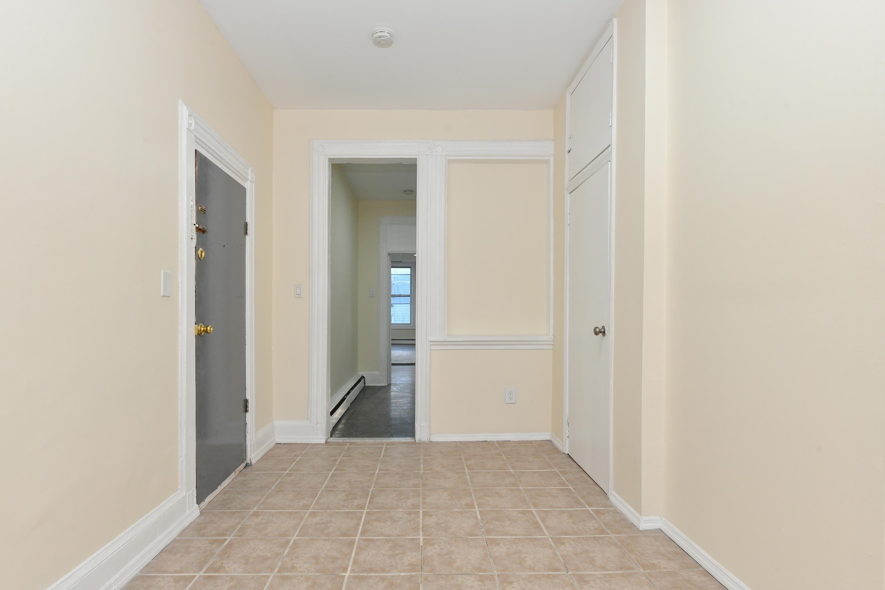 531 28th Street, Unit 1 Union City, NJ 07087 - Photo 11 of 21 a view of a hallway with wooden floor