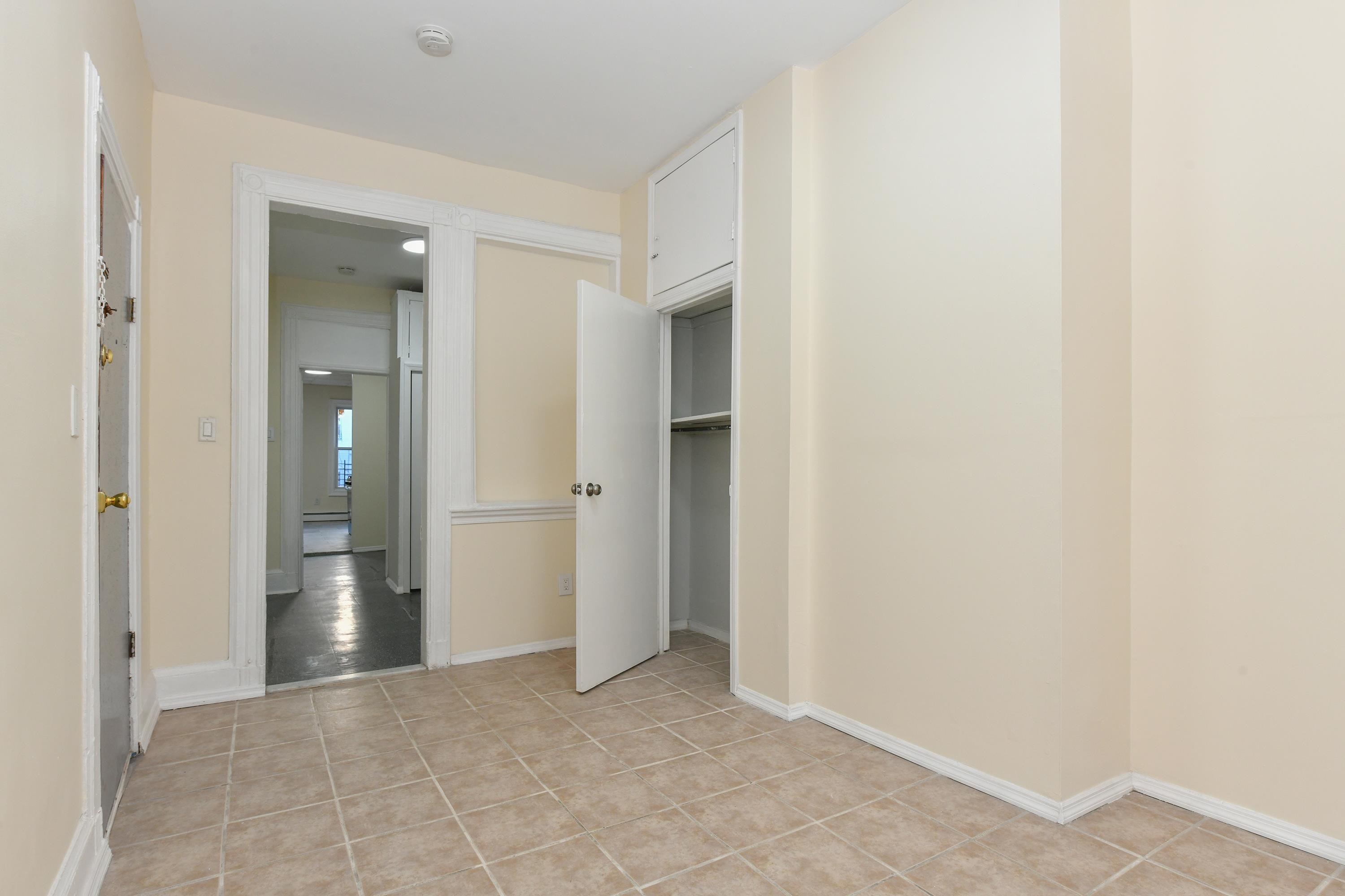 531 28th Street, Unit 1 Union City, NJ 07087 - Photo 10 of 21 a view of an empty room and bathroom