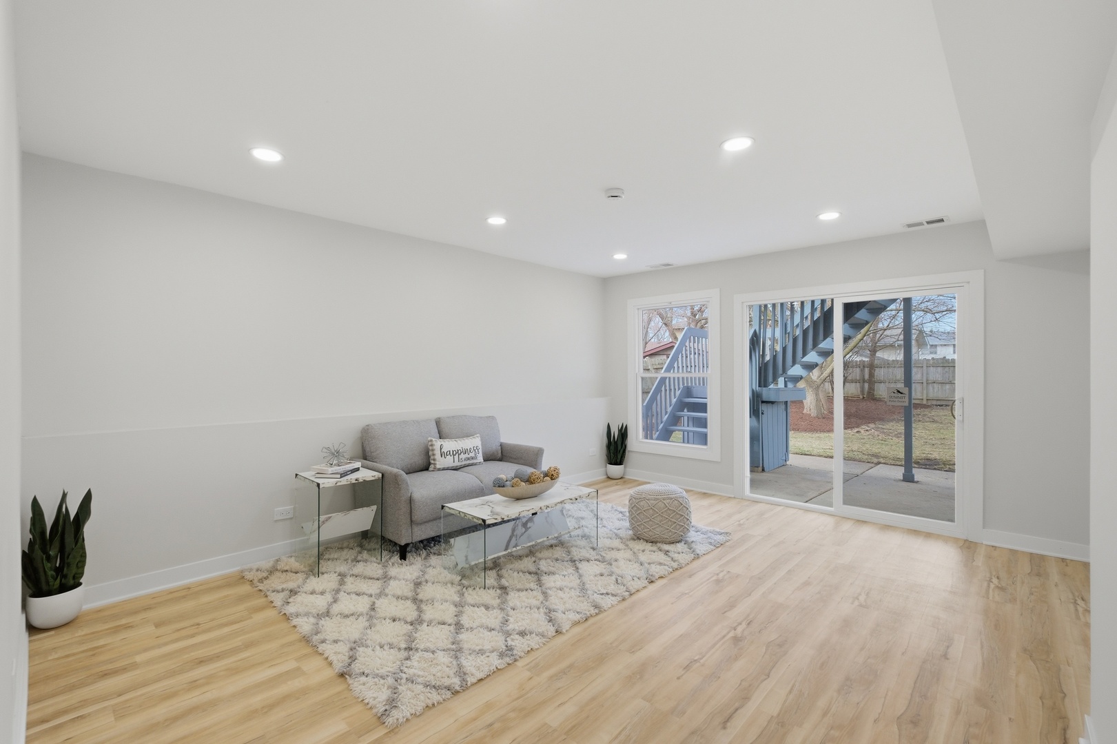 1450 Meyer Road Hoffman Estates, IL 60169 - Photo 14 of 28 a living room with furniture and a wooden floor