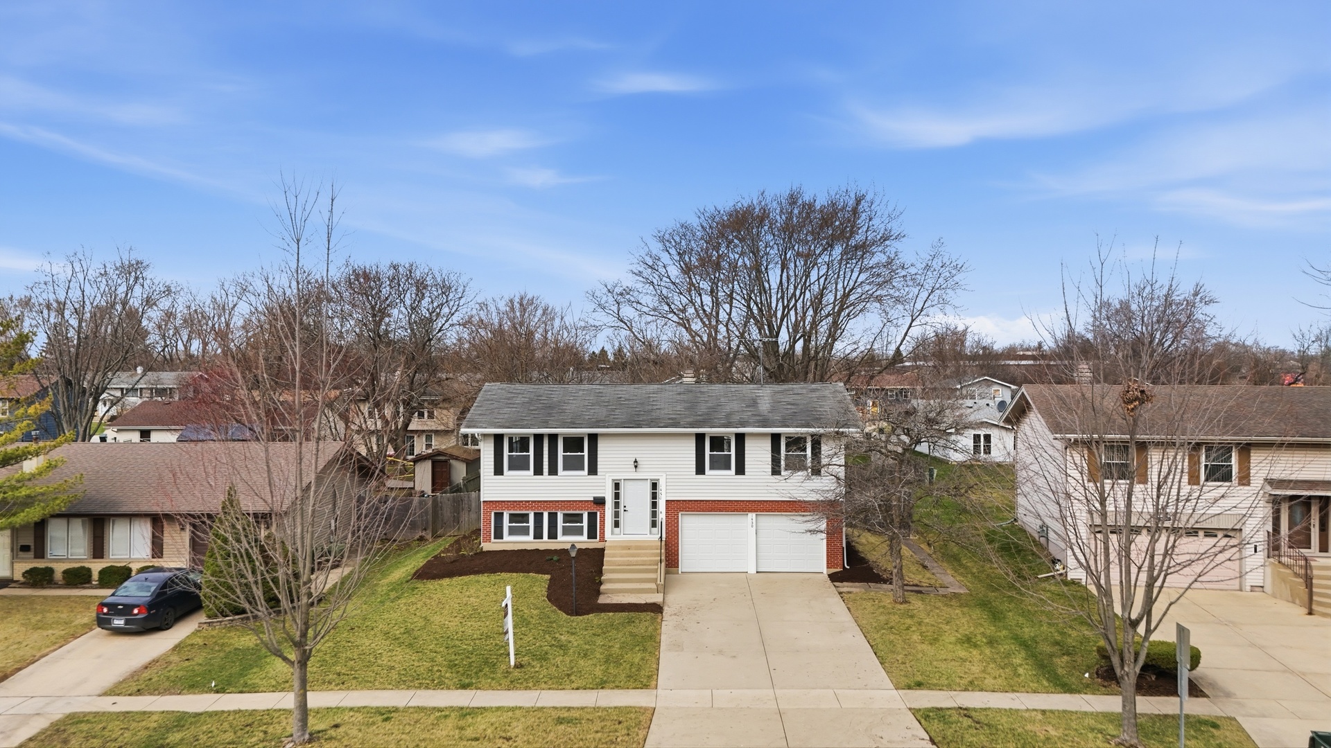 1450 Meyer Road Hoffman Estates, IL 60169 - Photo 25 of 28 a view of a house with a yard