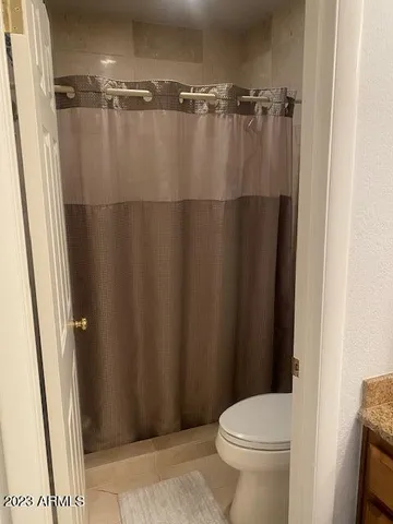 a bathroom with a sink and toilet