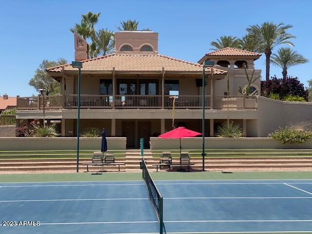 9707 East Mountain View Road, Unit 1414 Scottsdale, AZ 85258 - Photo 26 of 40 a view of a house with a terrace