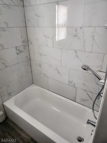 a bathroom with a bathtub