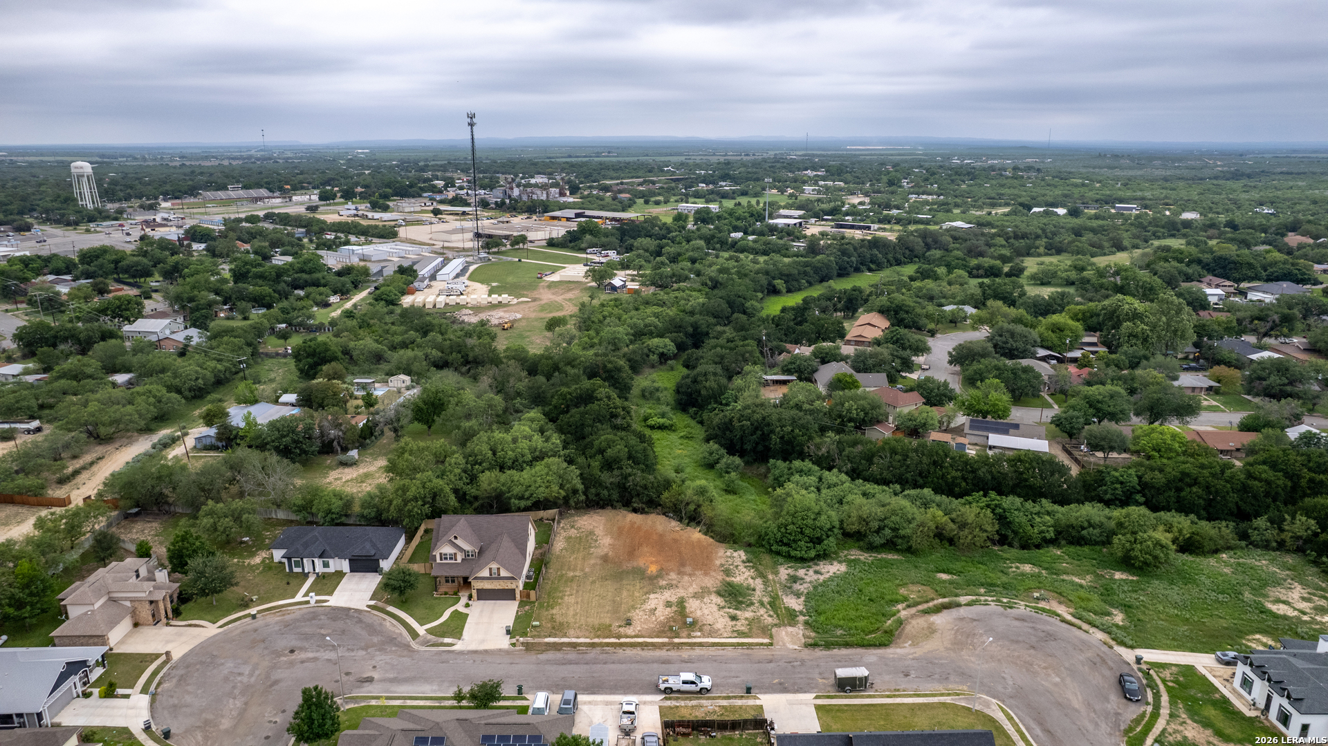 19 Rio Seco Drive Uvalde, TX 78801 - Photo 4 of 10 an aerial view of residential houses with outdoor space and trees