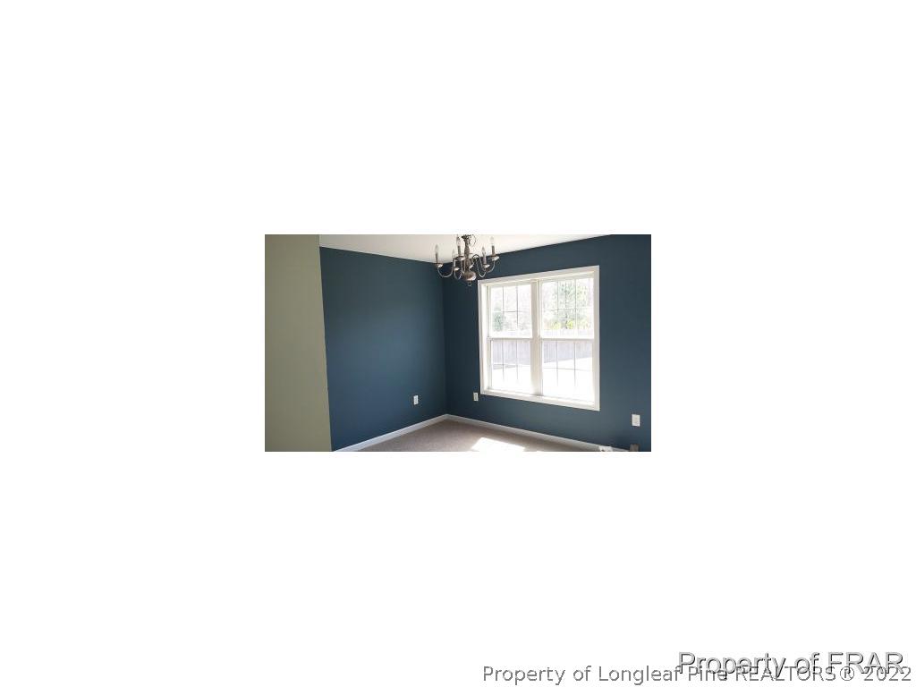 712 Cape Fear Road Raeford, NC 28376 - Photo 3 of 12 a living room with a window