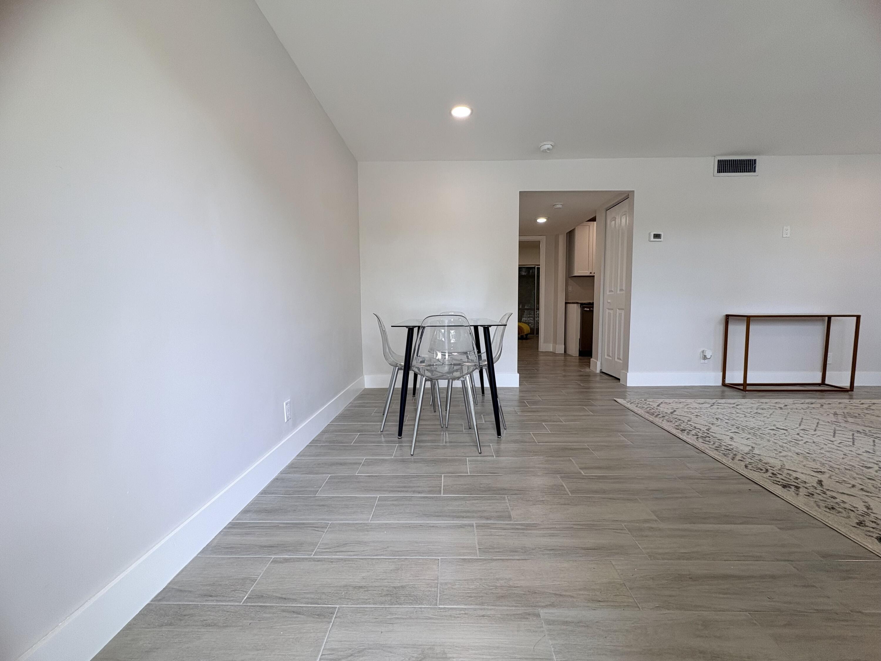 2202 Northeast 36th Street, Unit 17 Lighthouse Point, FL 33064 - Photo 5 of 28 ENTRYFROMDOOR