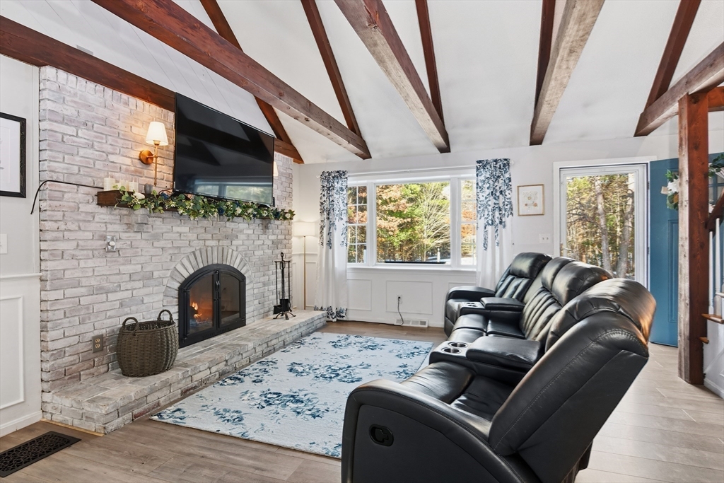80 Walnut Street Middleboro, MA 02346 - Photo 12 of 34 a living room with furniture and a fireplace