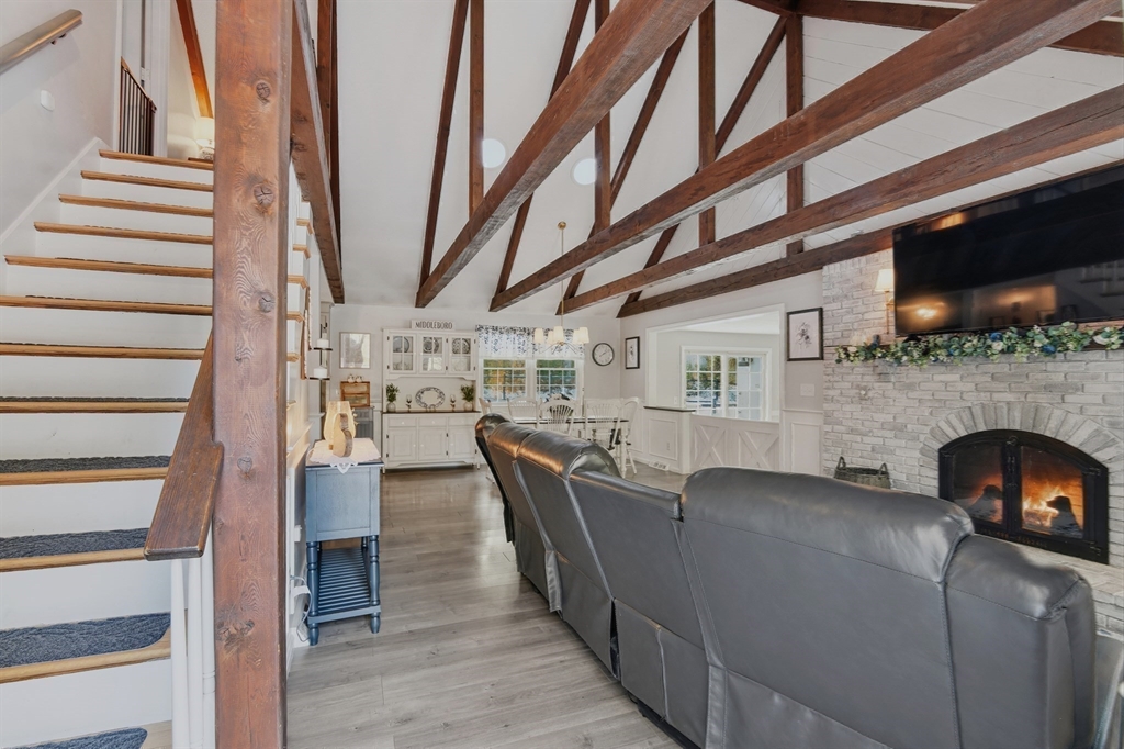 80 Walnut Street Middleboro, MA 02346 - Photo 13 of 34 a living room with furniture and a fireplace