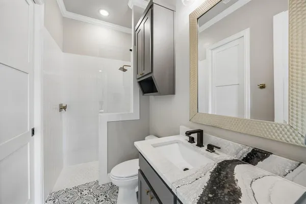 a bed room with a bed and a couch