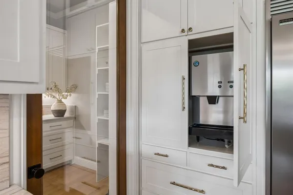 a view of cabinets and window