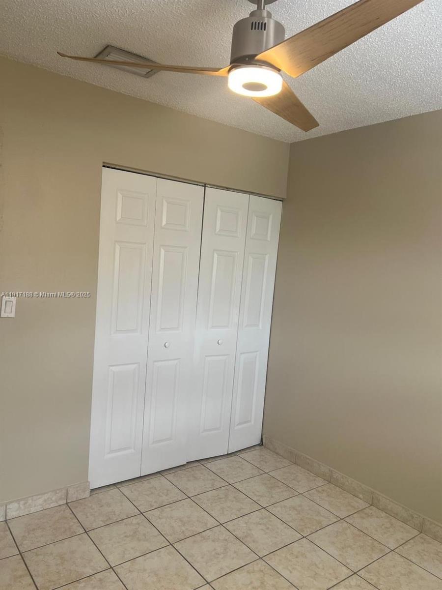 5306 West 26th Avenue, Unit 102 Hialeah, FL 33016 - Photo 15 of 33 a view of an empty room