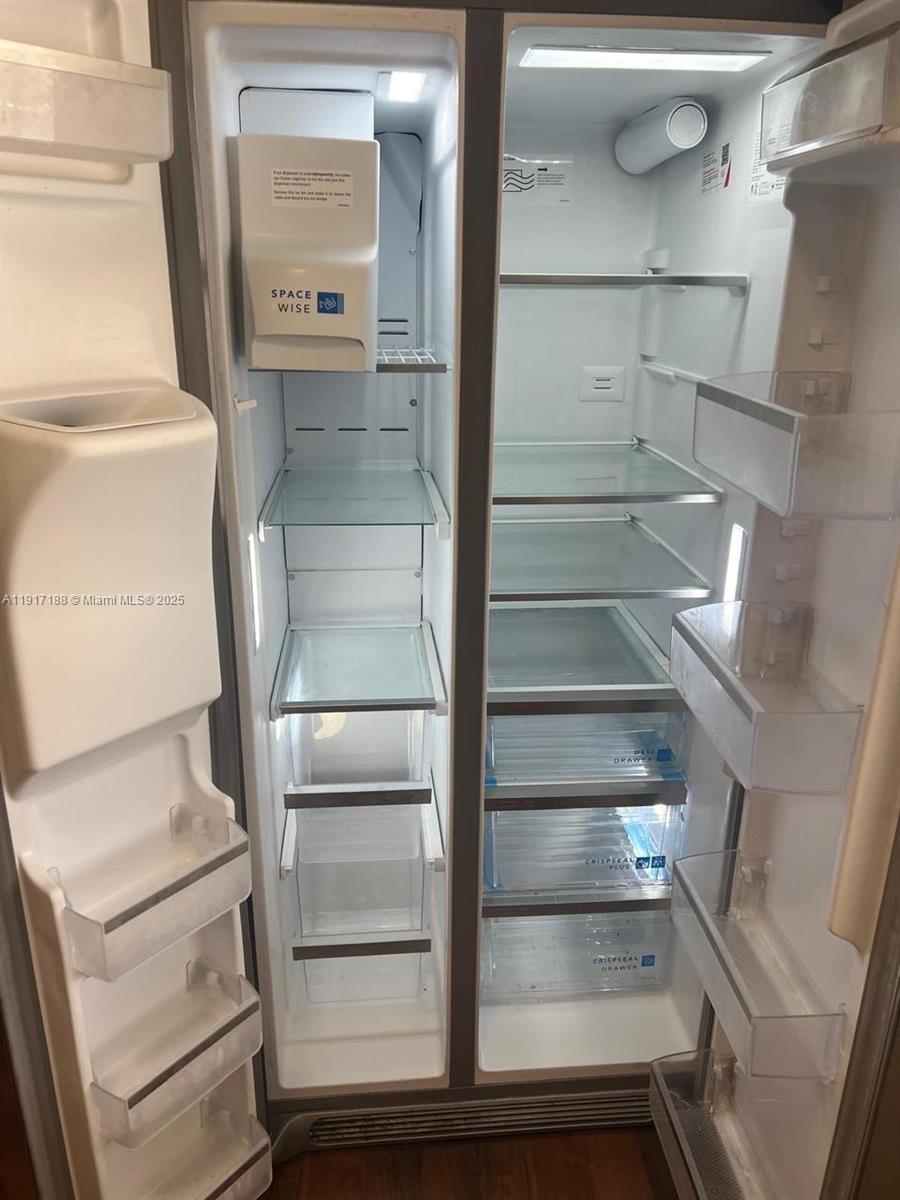 5306 West 26th Avenue, Unit 102 Hialeah, FL 33016 - Photo 21 of 33 a view of walk in closet