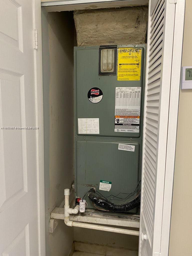 5306 West 26th Avenue, Unit 102 Hialeah, FL 33016 - Photo 26 of 33 a view of water heater room