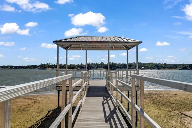 a view of a lake with sitting space