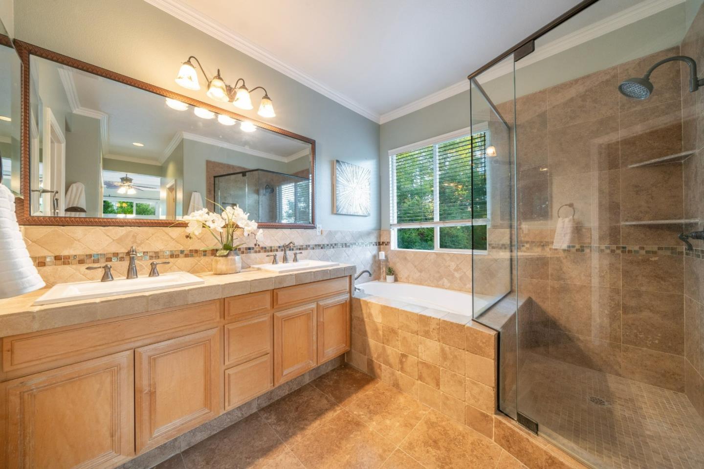 1486 Bay Tree Drive Gilroy, CA 95020 - Photo 15 of 26 a large bathroom with a large tub and sink