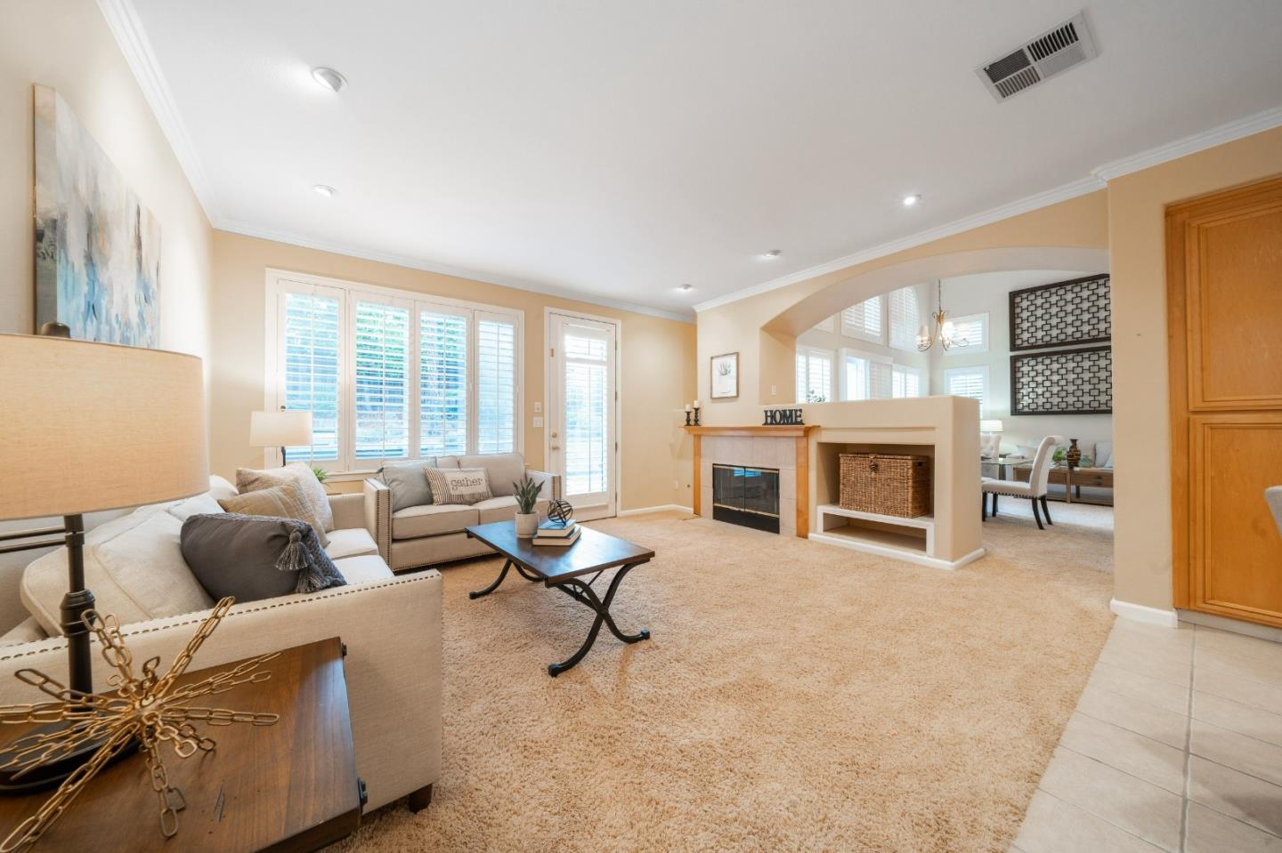 1486 Bay Tree Drive Gilroy, CA 95020 - Photo 6 of 26 a living room with furniture and fireplace