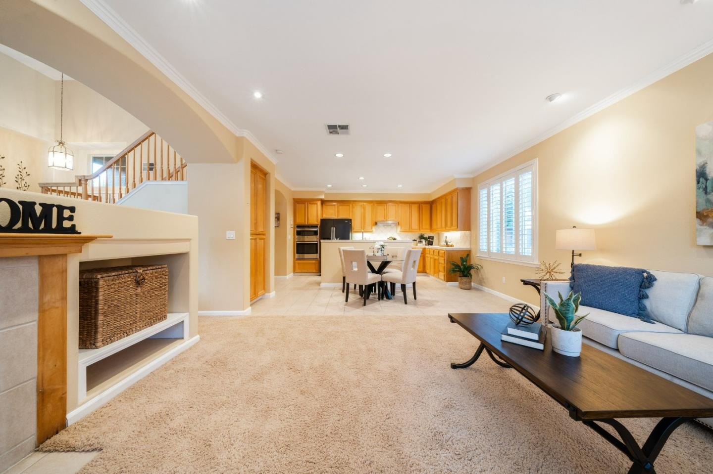 1486 Bay Tree Drive Gilroy, CA 95020 - Photo 7 of 26 a living room with furniture and fireplace