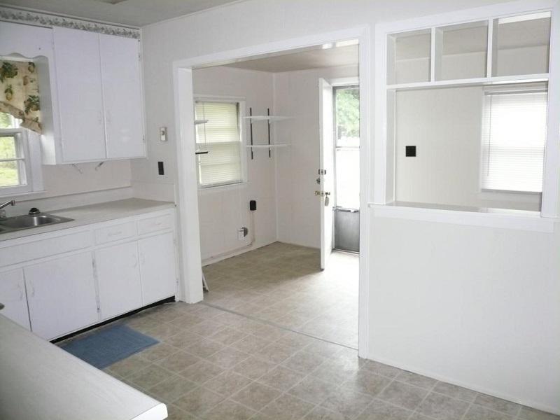 2032 Burma Road Salem, VA 24153 - Photo 14 of 15 a view of a kitchen with white cabinets