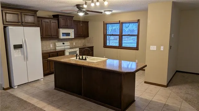 $280,000 | 1408 Country Club Drive, Pleasant Hill, MO 64080