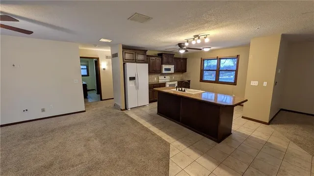 $280,000 | 1408 Country Club Drive, Pleasant Hill, MO 64080