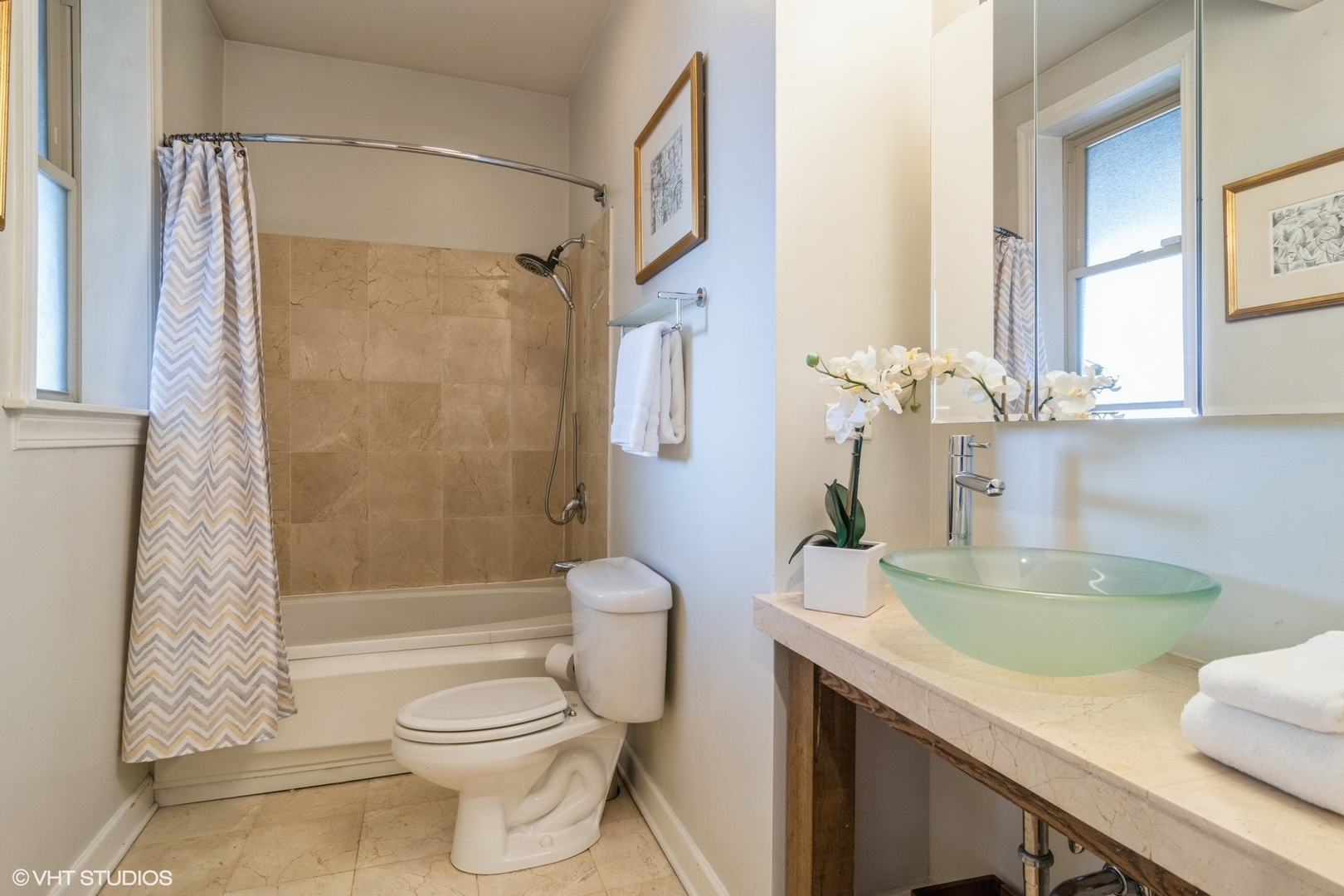 3105 West George Street, Unit 1 Chicago, IL 60618 - Photo 8 of 11 a bathroom with a granite countertop sink toilet and shower