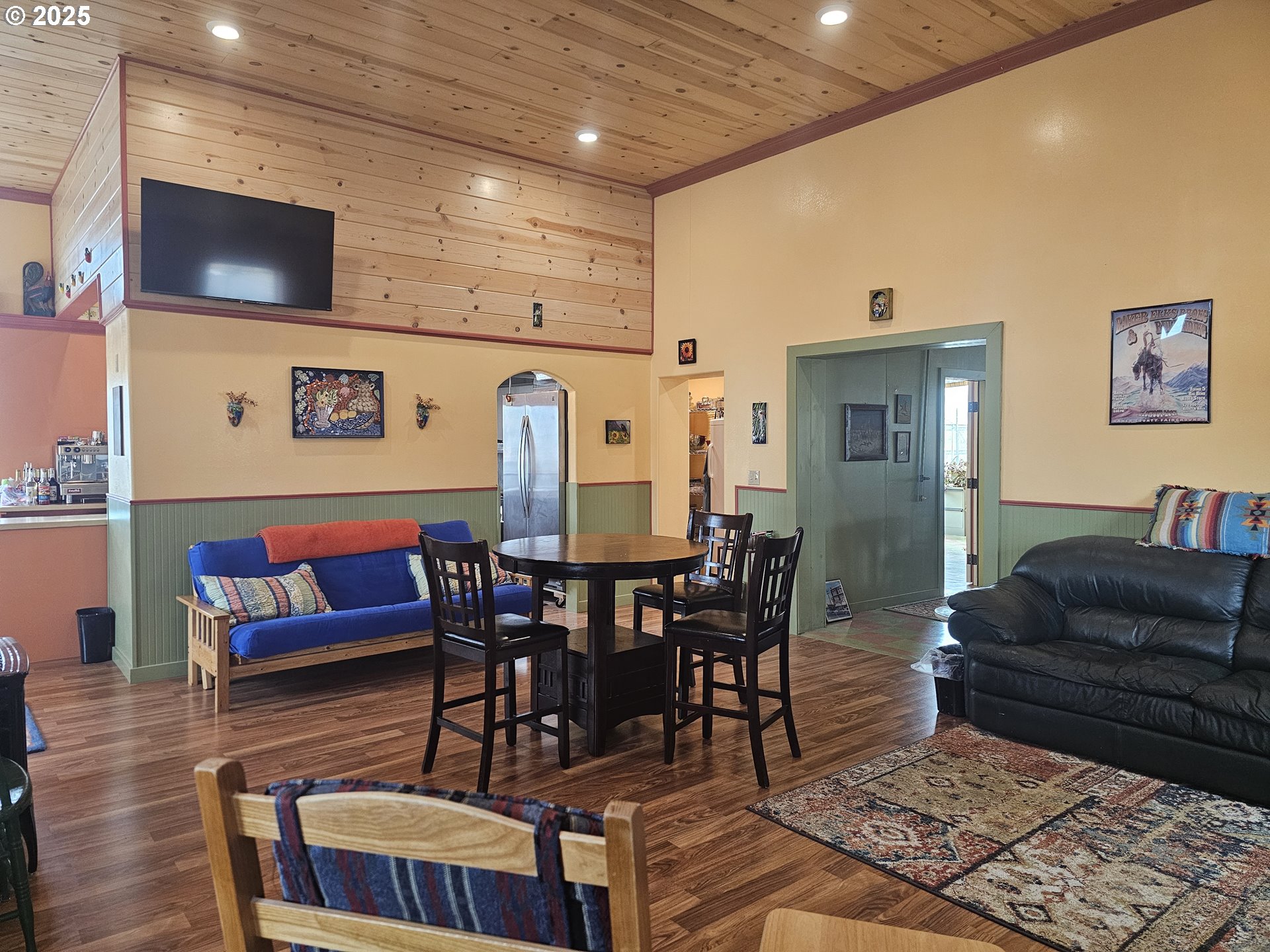 995 3rd Street North Powder, OR 97867 - Photo 26 of 28 a living room with furniture and a flat screen tv