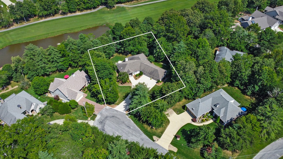 44 Inwood Court Crossville, TN 38558 - Photo 1 of 54 an aerial view of a house with a garden