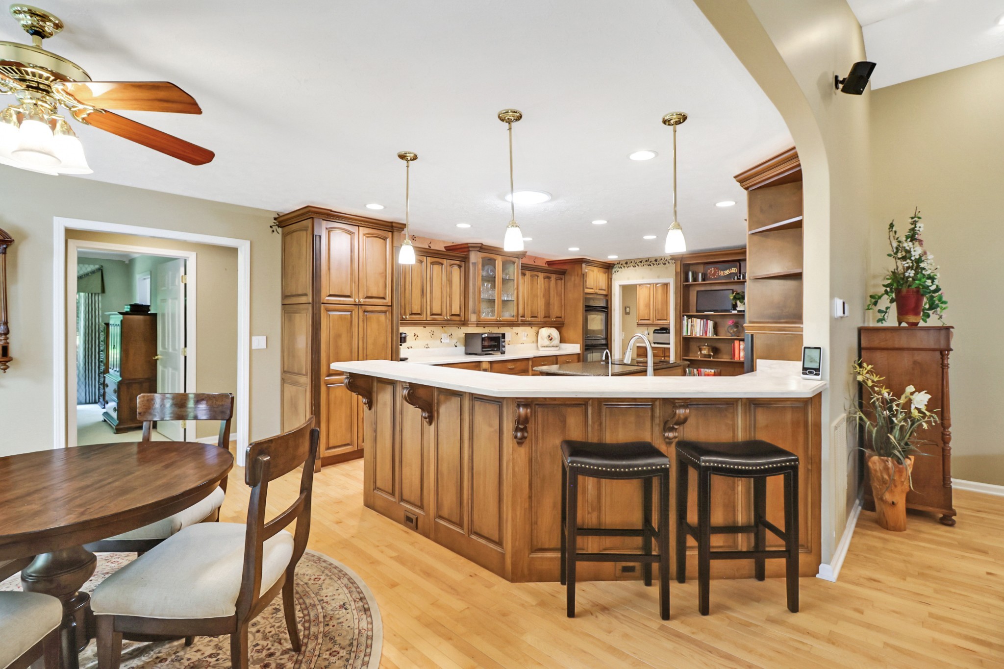 44 Inwood Court Crossville, TN 38558 - Photo 12 of 54 a kitchen with kitchen island a dining table and chairs