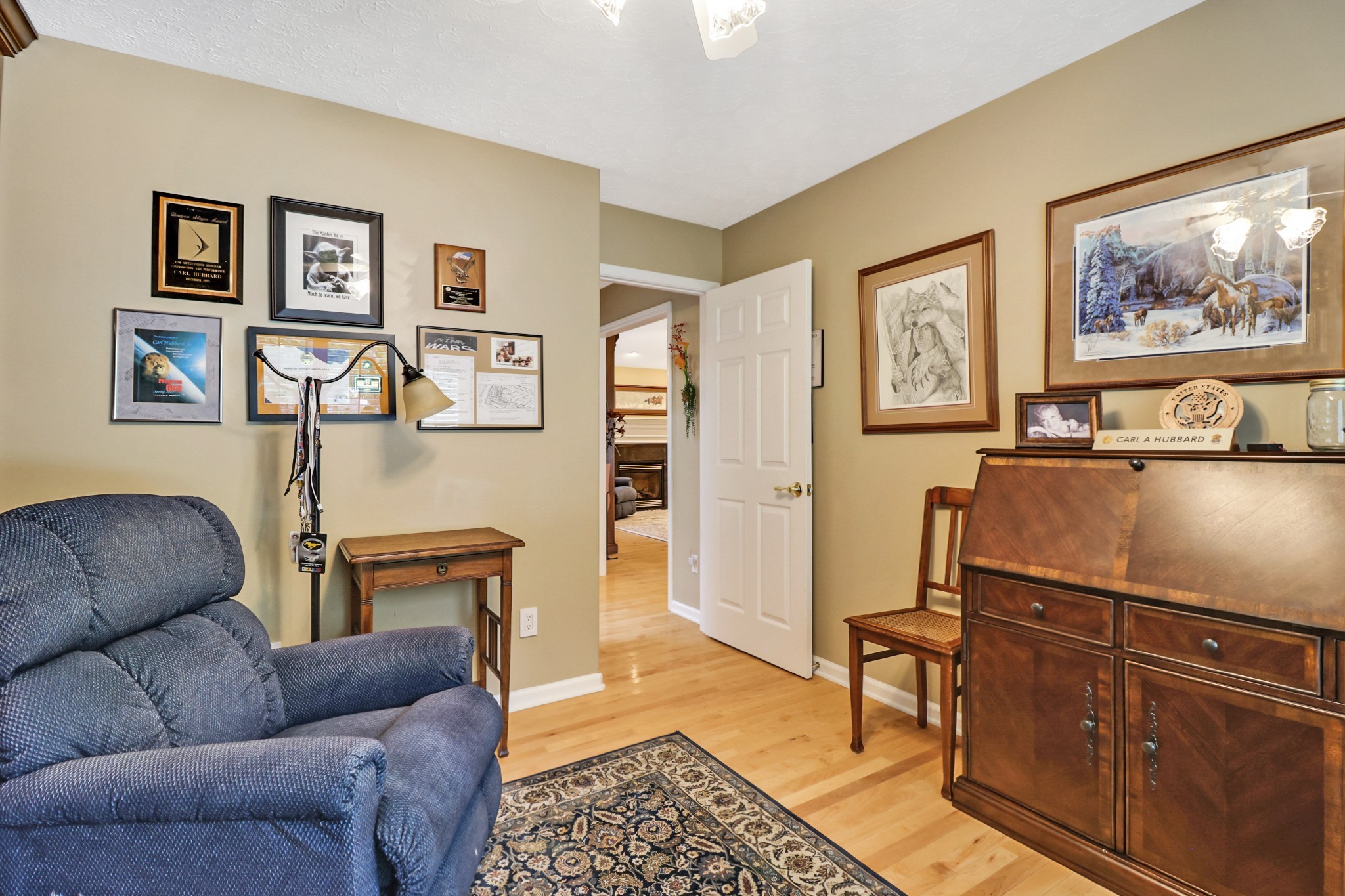 44 Inwood Court Crossville, TN 38558 - Photo 25 of 54 a living room with furniture and painting on the wall