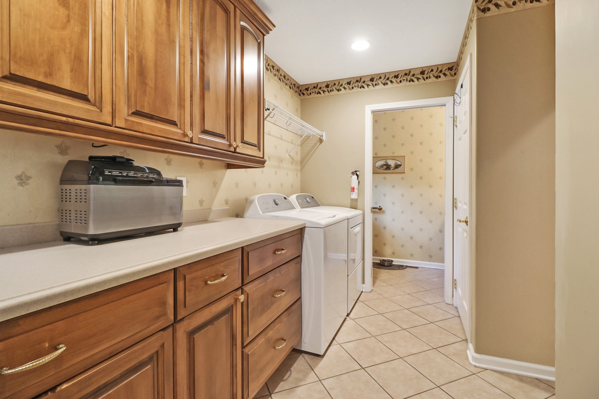 44 Inwood Court Crossville, TN 38558 - Photo 30 of 54 a bathroom with a sink a vanity and two mirror