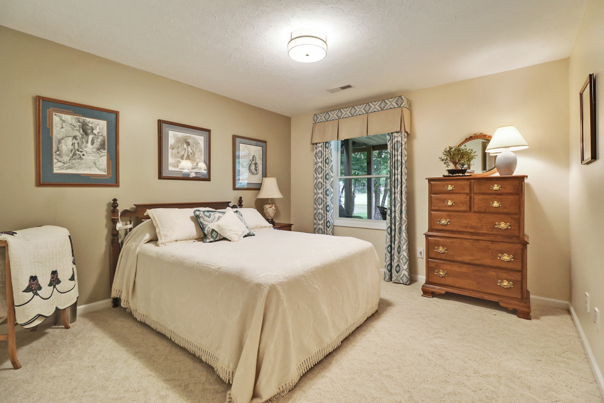 44 Inwood Court Crossville, TN 38558 - Photo 40 of 54 a spacious bedroom with a bed and a dresser