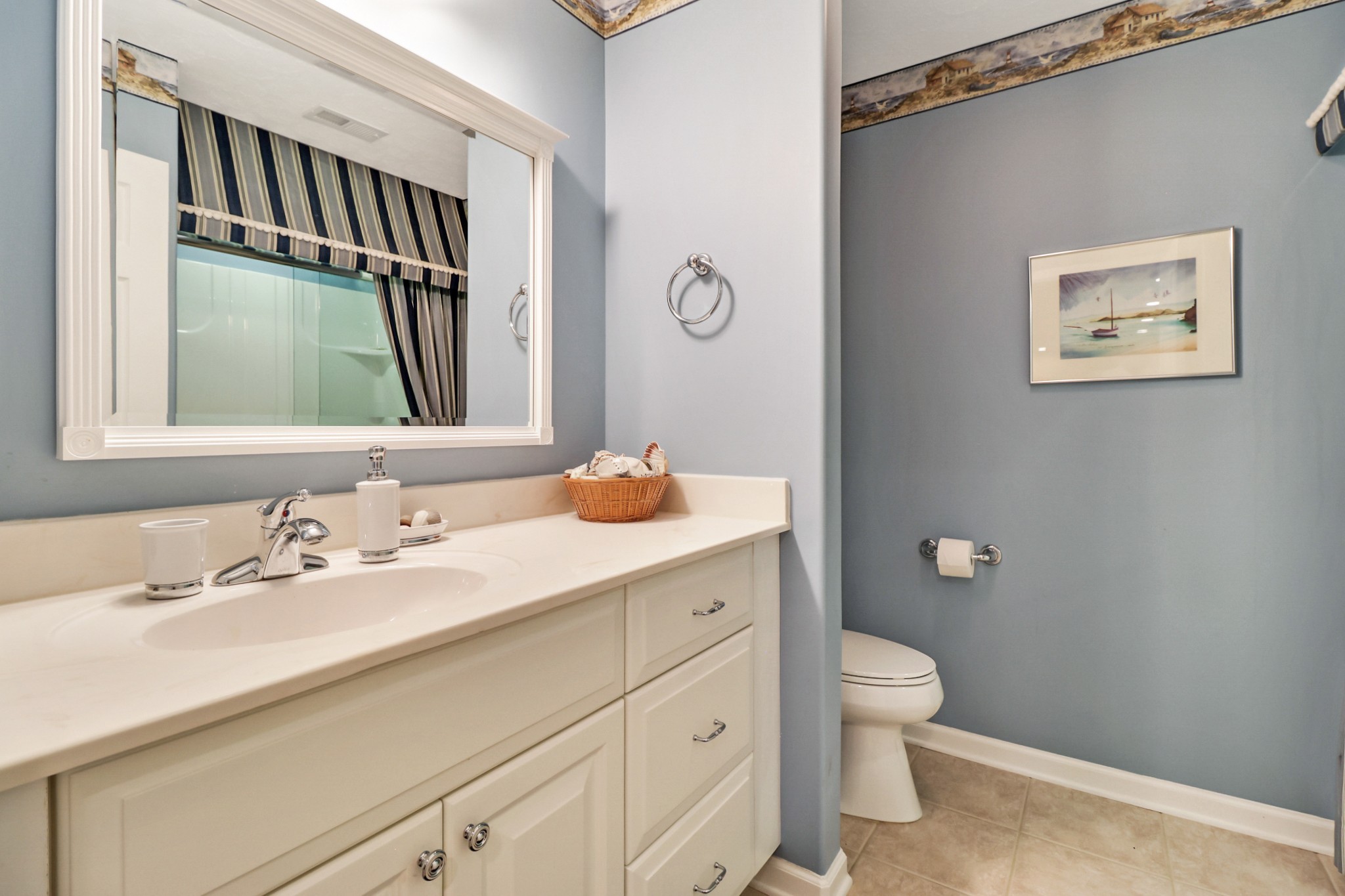 44 Inwood Court Crossville, TN 38558 - Photo 42 of 54 a bathroom with a sink a toilet and a mirror