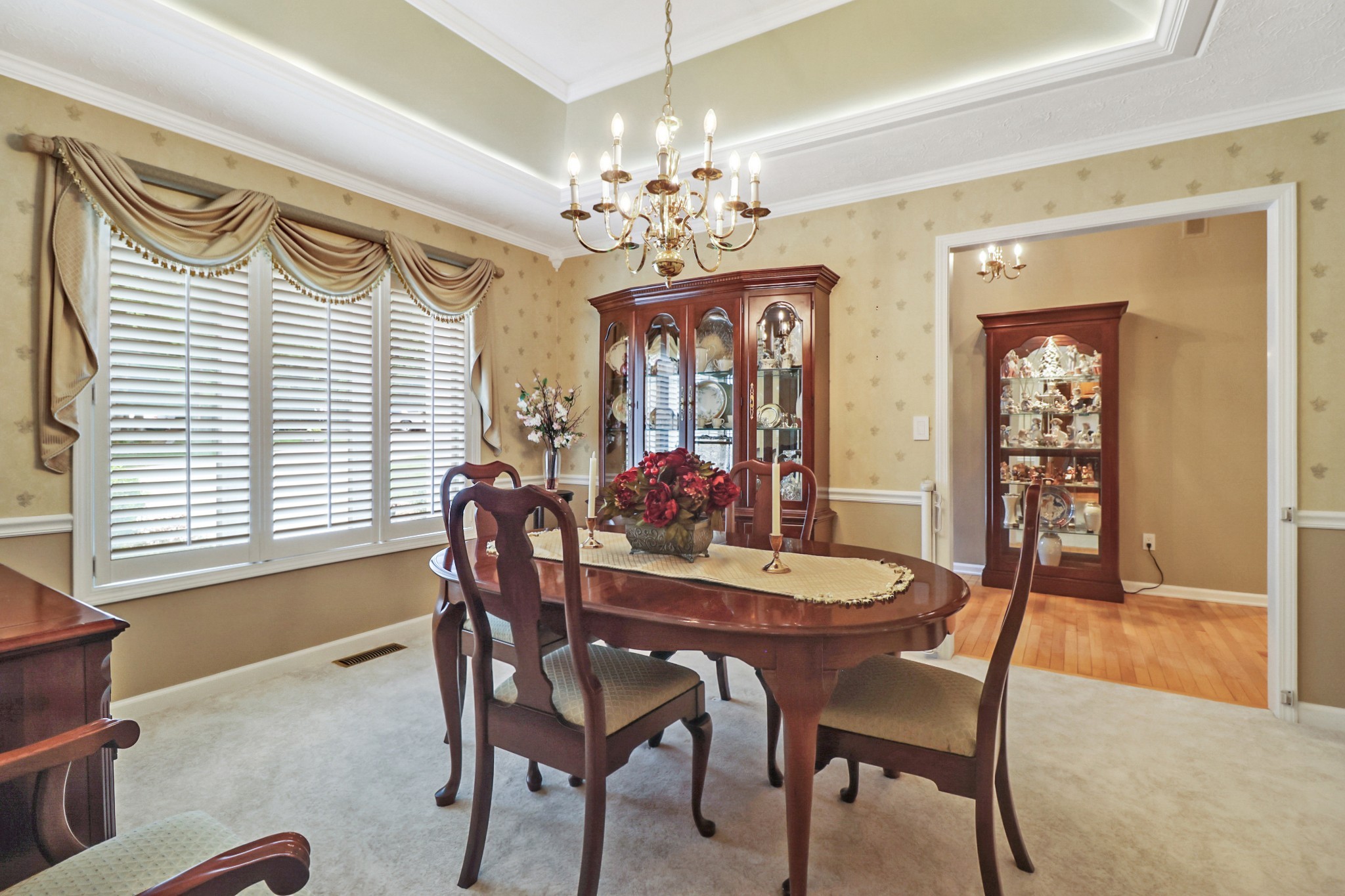 44 Inwood Court Crossville, TN 38558 - Photo 7 of 54 a view of a dining room with furniture and a chandelier