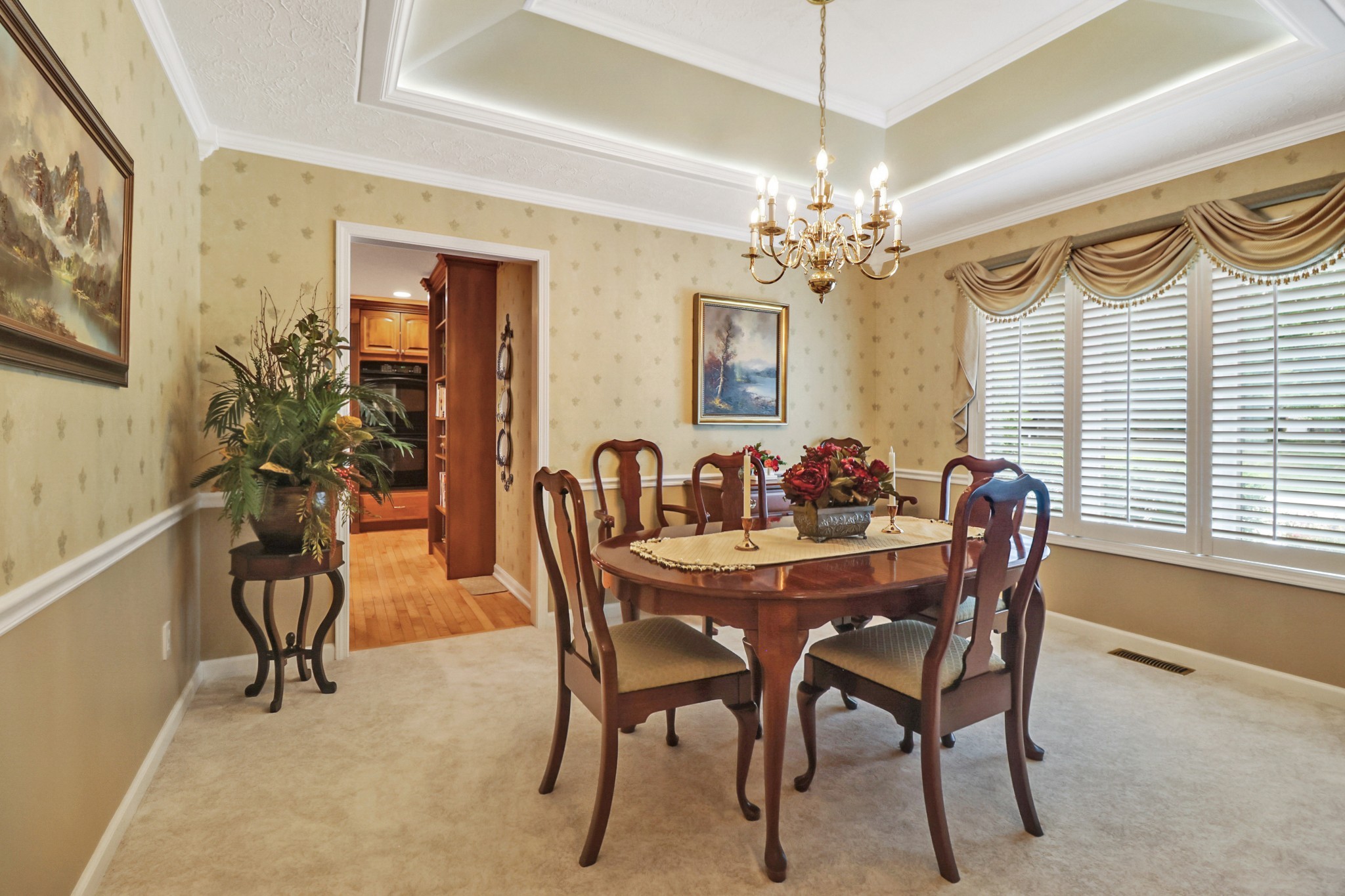 44 Inwood Court Crossville, TN 38558 - Photo 8 of 54 a view of a dining room with furniture and chandelier