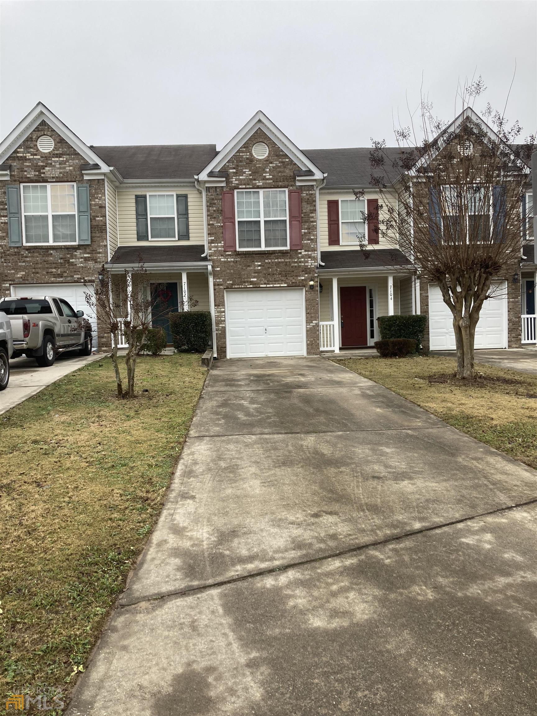 7104 Georges Way Morrow, GA 30260 - Photo 1 of 1 a big house with a big yard and large trees