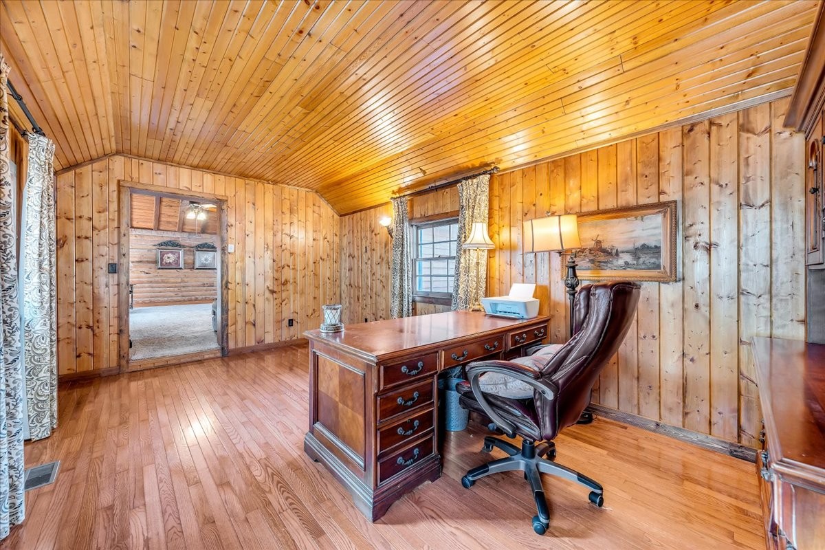 1006 Remington Place Manchester, TN 37355 - Photo 40 of 98 a view of a workspace with furniture and wooden floor