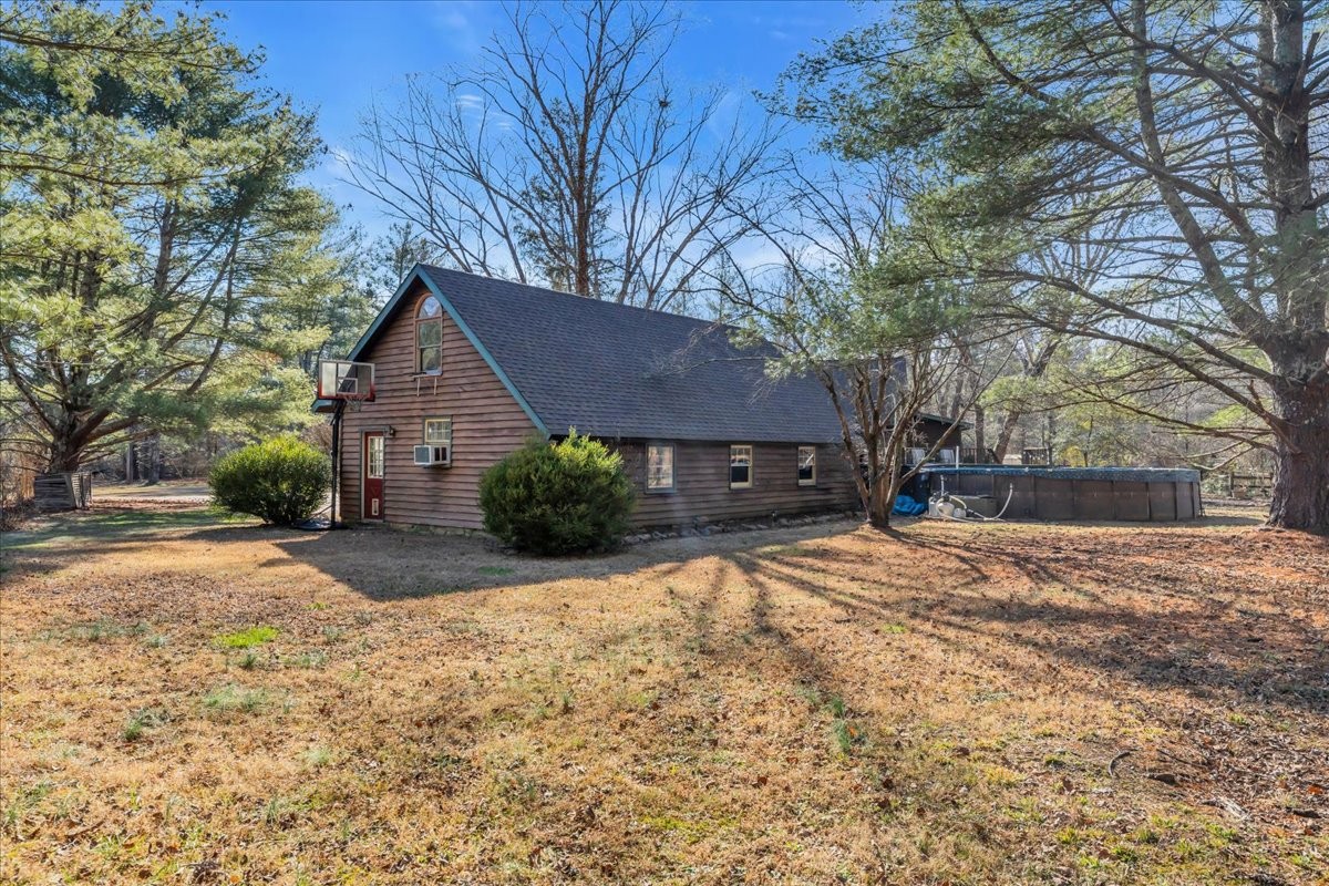 1006 Remington Place Manchester, TN 37355 - Photo 52 of 98 a front view of a house with yard and trees