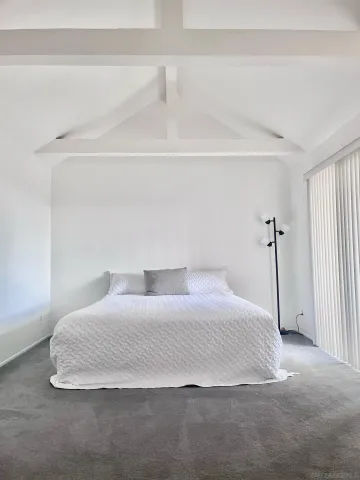 a bathroom with a double vanity sink mirror and shower