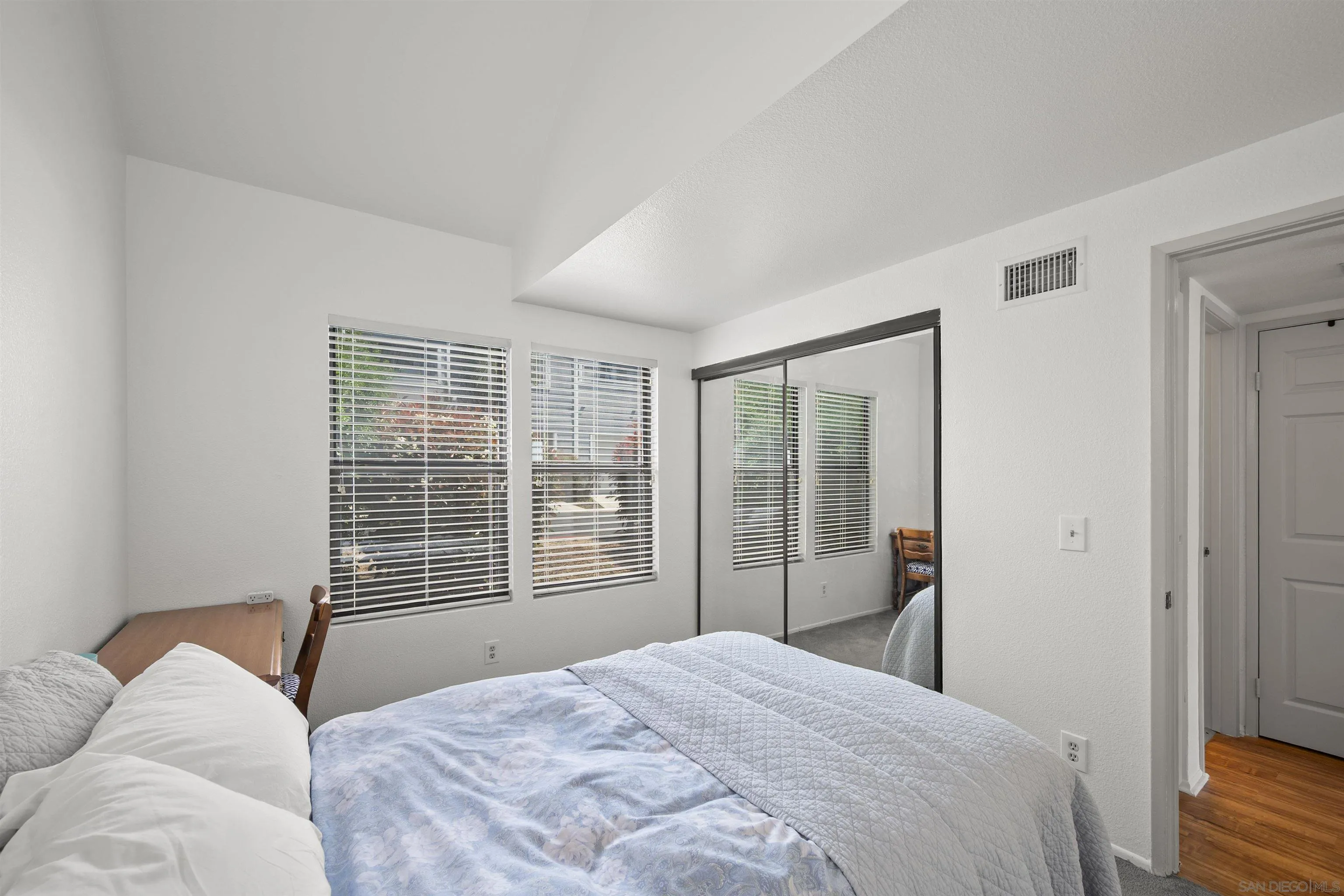 11061 Scripps Ranch Boulevard San Diego, CA 92131 - Photo 22 of 66 a bedroom with a bed and a window