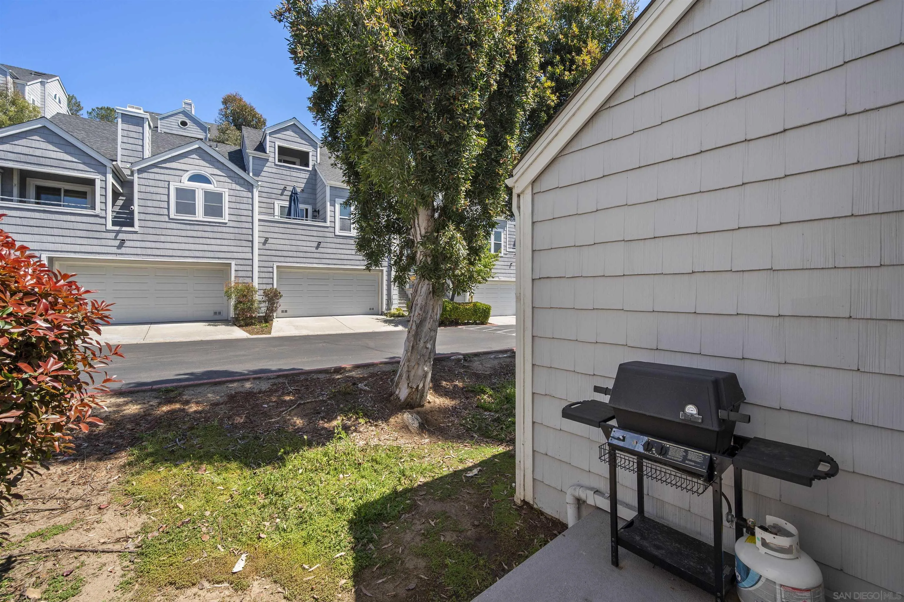 11061 Scripps Ranch Boulevard San Diego, CA 92131 - Photo 27 of 66 a front view of a house with garden