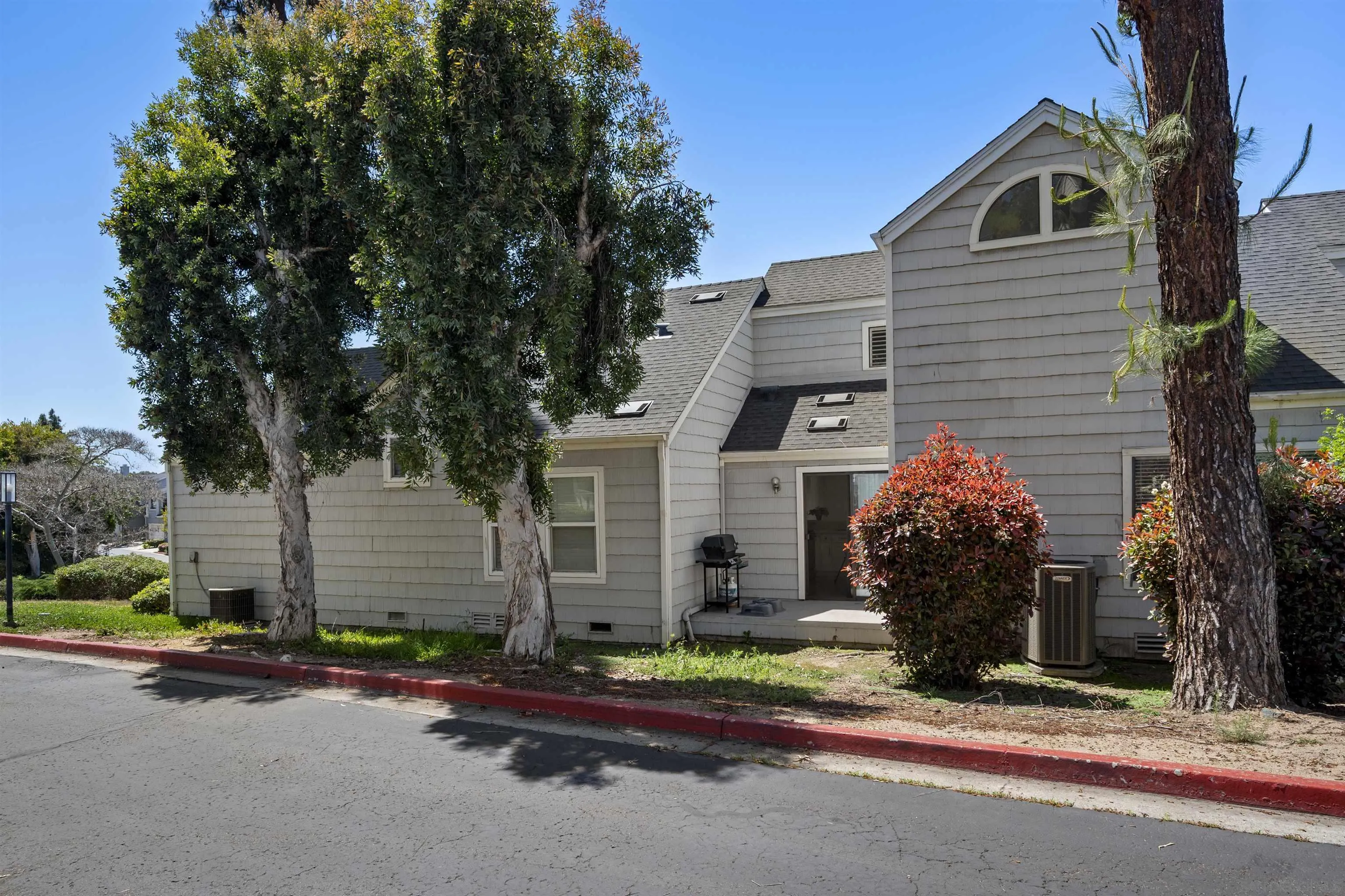 11061 Scripps Ranch Boulevard San Diego, CA 92131 - Photo 31 of 66 front view of a house with a street