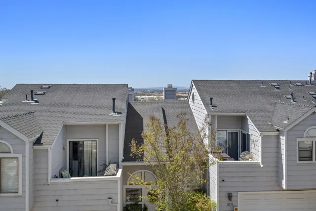 a view of a swimming pool with a lounge chair