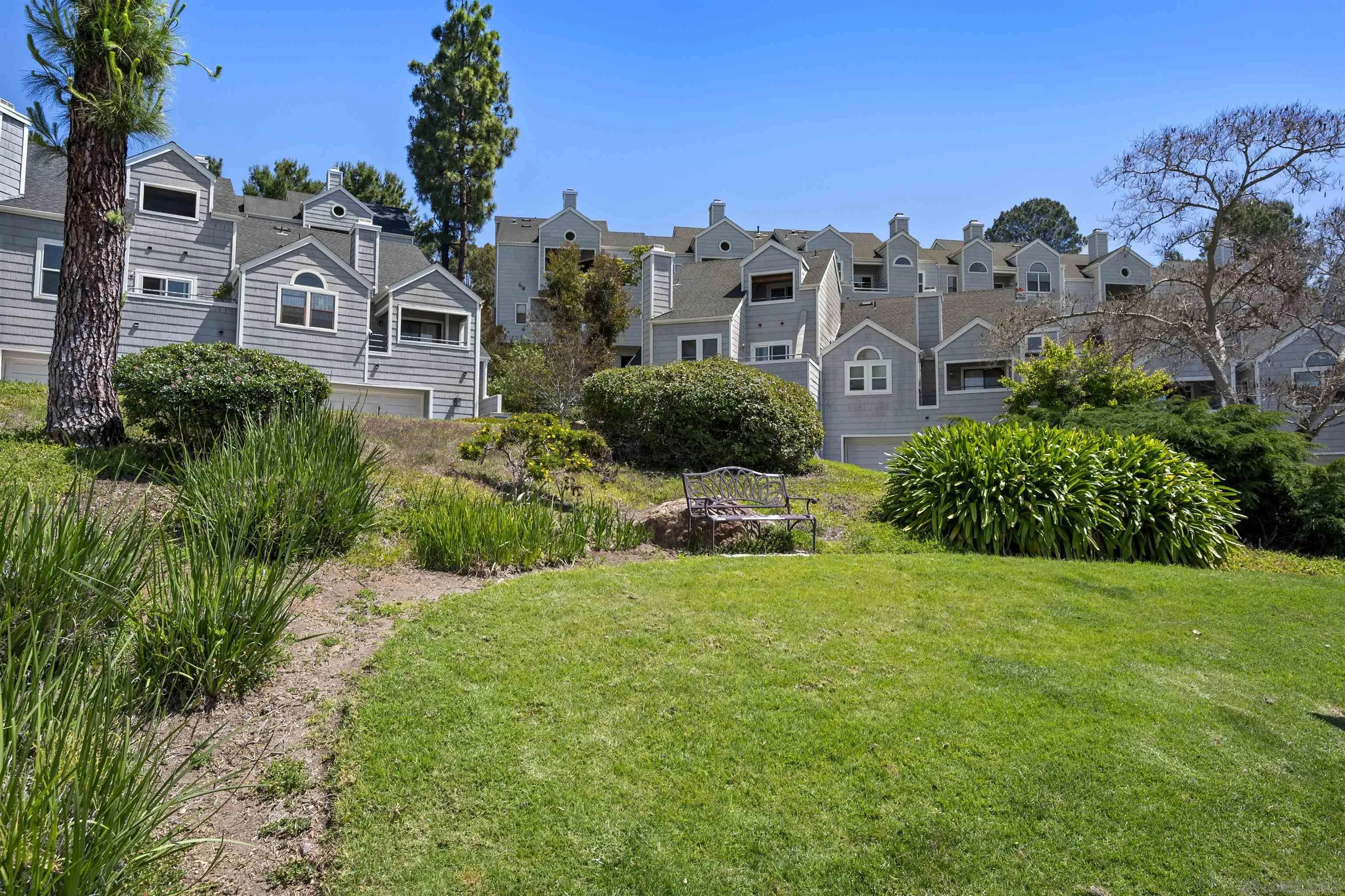 11061 Scripps Ranch Boulevard San Diego, CA 92131 - Photo 37 of 66 a front view of a house with a garden
