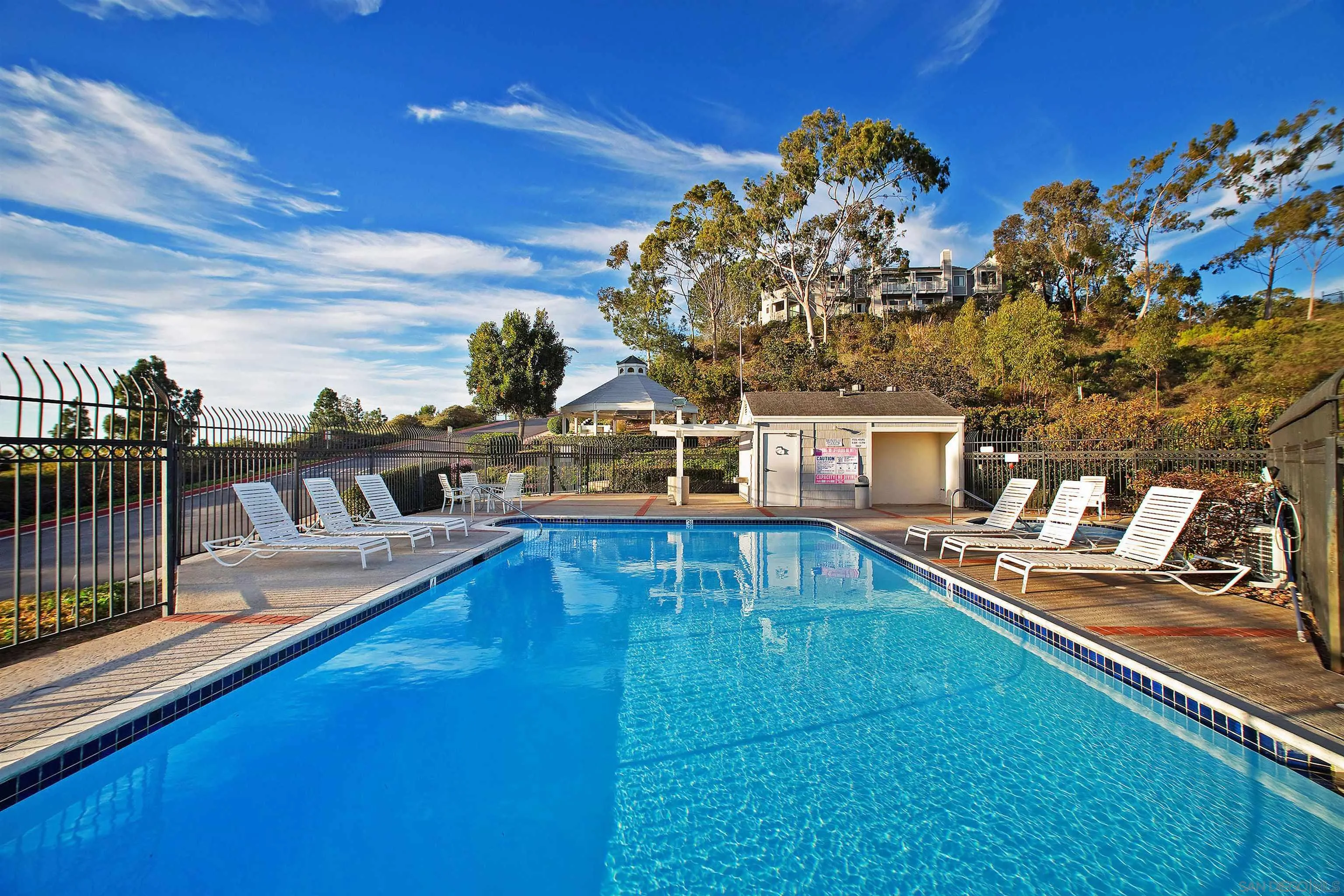 11061 Scripps Ranch Boulevard San Diego, CA 92131 - Photo 43 of 66 a view of a swimming pool with seating area