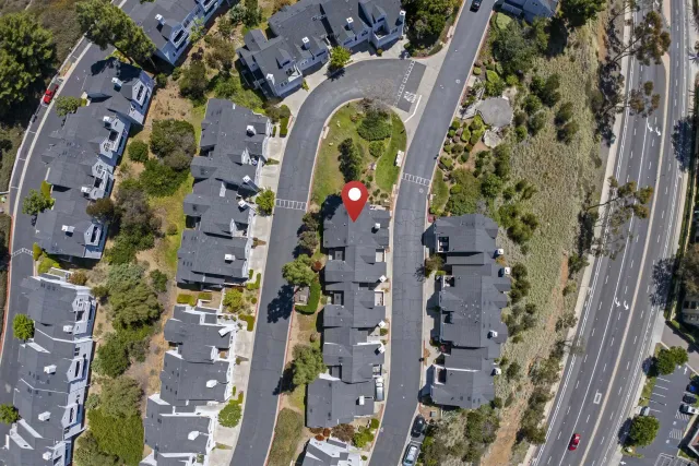 a view of a yard with a tree