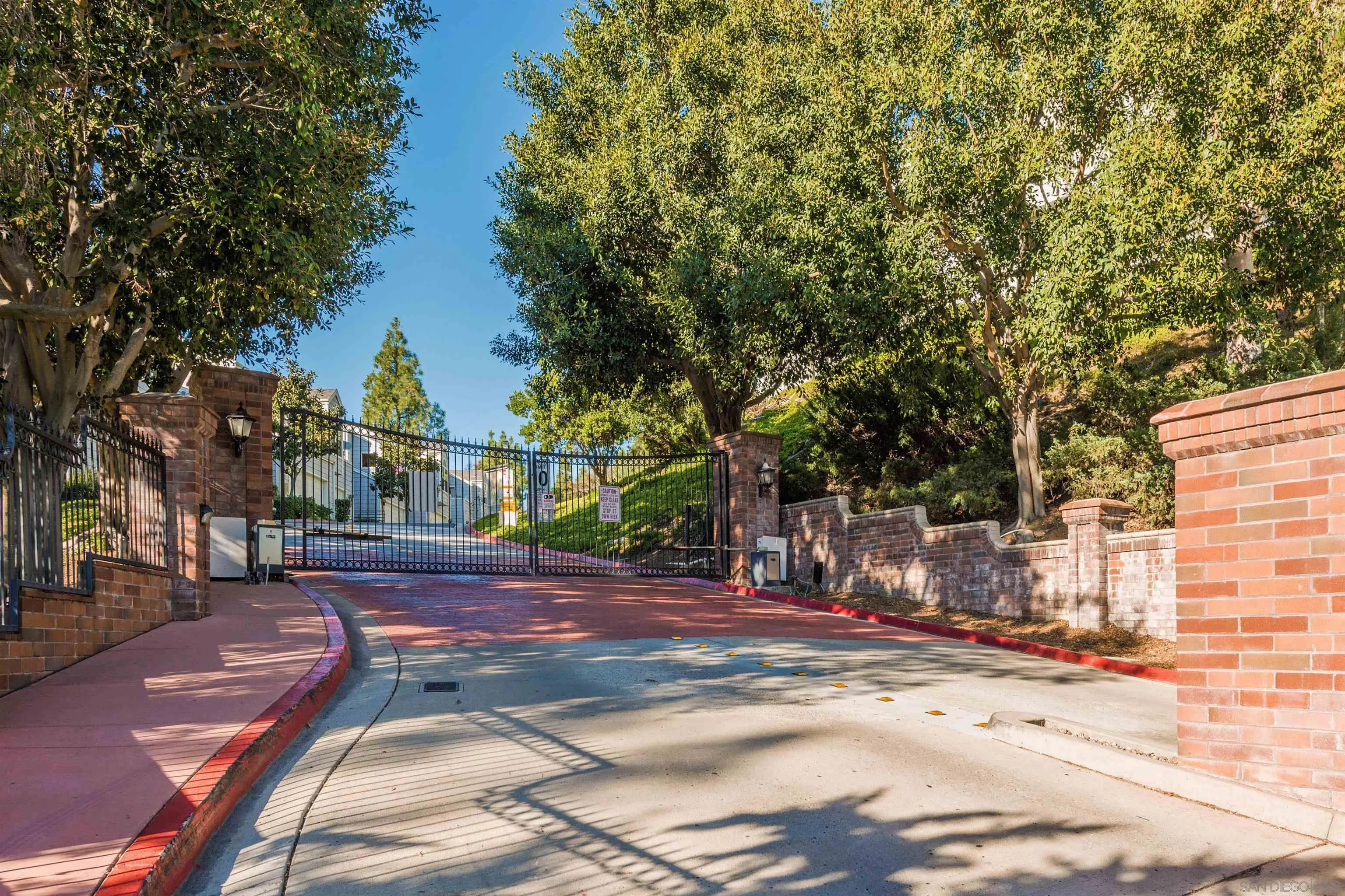 11061 Scripps Ranch Boulevard San Diego, CA 92131 - Photo 57 of 66 a view of a street with houses on both side of it