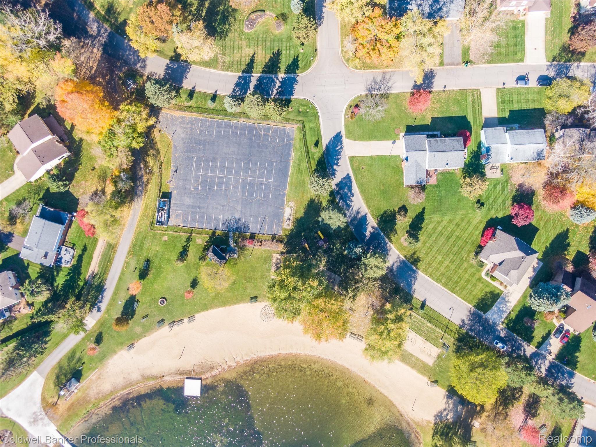 2481 Eaton Gate Road Lake Orion, MI 48360 - Photo 19 of 71 Aerial view of private beach and clubhouse
