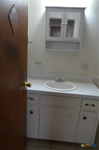 a bathroom with a bathtub and a toilet