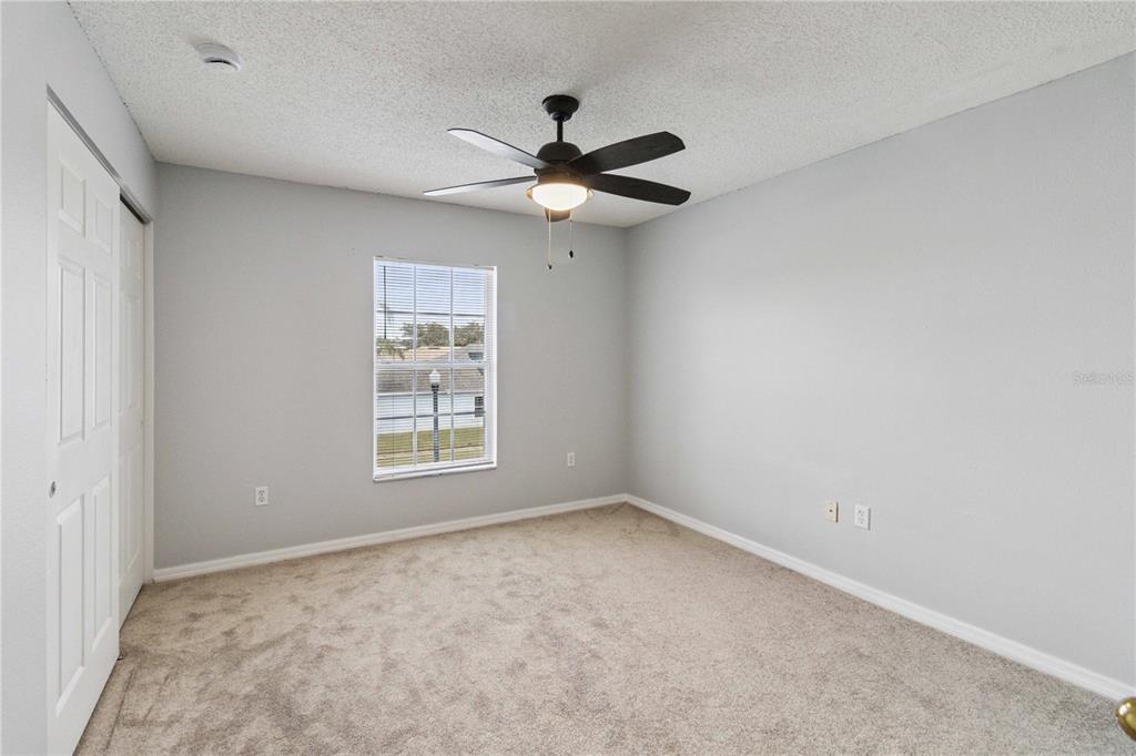 2881 Lyndscape Street Orlando, FL 32833 - Photo 16 of 30 a view of an empty room with a window