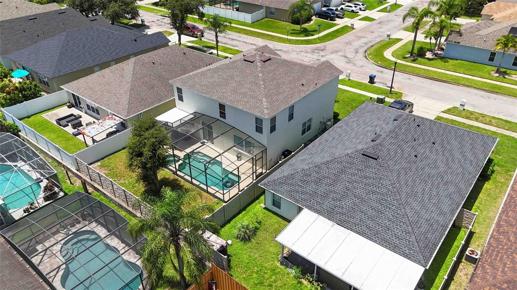 2881 Lyndscape Street Orlando, FL 32833 - Photo 21 of 30 an aerial view of a house with a backyard